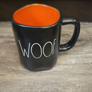 Rae Dunn Black and Orange Woof Mug